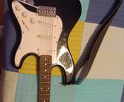 Electric Guitar with Amplifier
 - Image