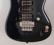 Floyd Rose type electric guitar
 - Image