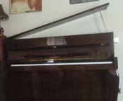 Schimmel lacquered mahogany upright piano
 - Image