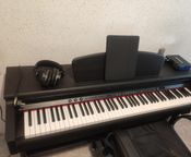 Upright digital piano for sale
 - Image