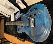 GODIN LGXT Trans Llama Azul AA MultiVoz
 - Imagen