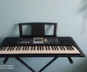 Yamaha piano with built-in stand
 - Image