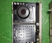 Dj cd equipment plus table and transport case.
 - Image
