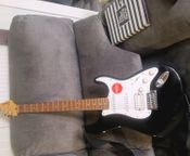 Electric guitar with amplifier
 - Image