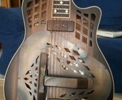 Amistar Tricone Resonator Guitar
 - Image