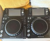 a pair of pioneer xdj 1000 mk2
 - Image