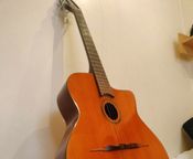 I am selling a Nash acoustic guitar valued at €10,000
 - Image
