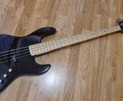 Under ESP LTD Elite J-4. Jazz Bass. Made in Japan
 - Image