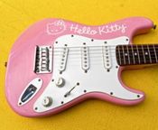 Squier Fender Mini Hello Kitty stratocaster guitar
 - Image