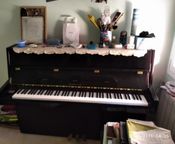 I am selling a pre-owned piano
 - Image