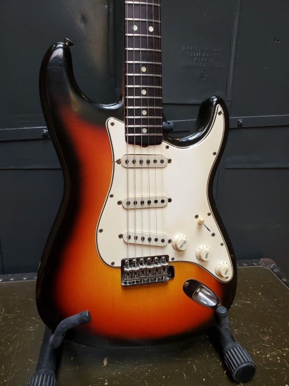 Vintage 1965 Fender Stratocaster electric guitar - Imagen por defecto